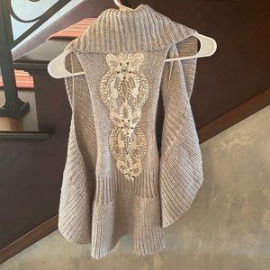 Like new embellished sweater vest